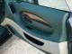 green-leather-aston-martin